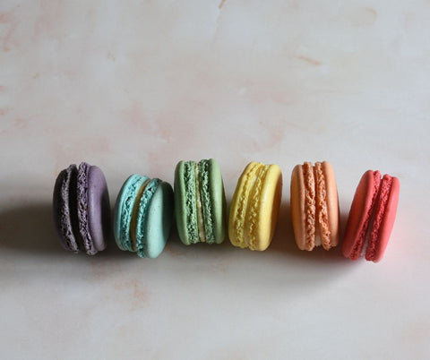 Vibrant rainbow macaron gift box for parties, weddings and celebrations, featuring classic French flavours