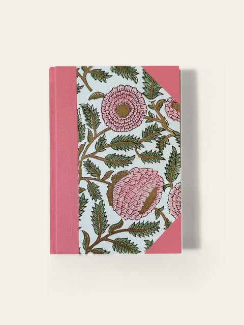 Hand-bound A5 notebook with coral pink cloth and pink block-print floral paper cover, blank pages, Sisu Stationery