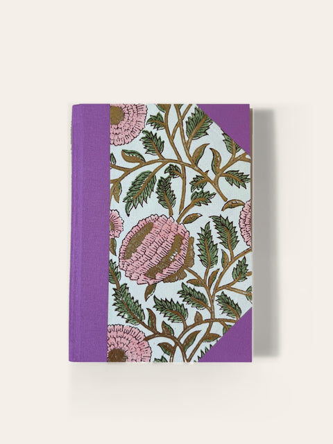 Hand-bound A5 notebook with lilac cloth and pink block-print floral paper cover, ruled pages, Sisu Stationery