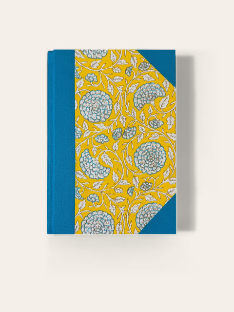 Hand-bound A5 notebook with turquoise cloth and yellow marigold block-print paper cover, ruled pages, Sisu Stationery