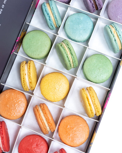 A colourful line-up of macaron flavours, ready to make any birthday or event sparkle.