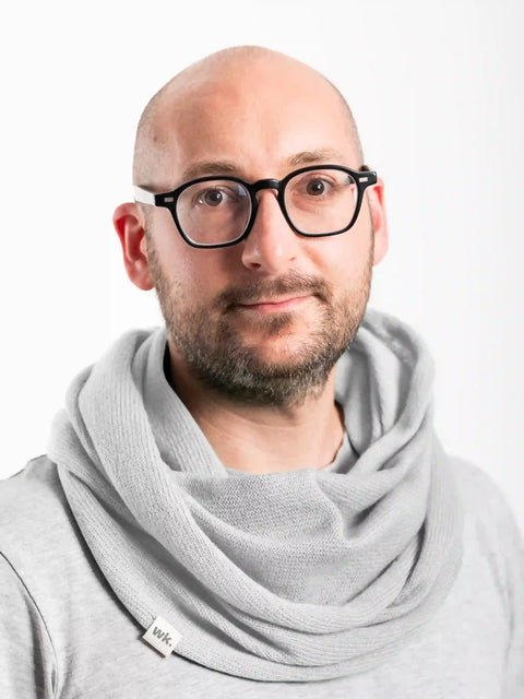 man wearing light grey merino wool infinity scarf - Woolkind