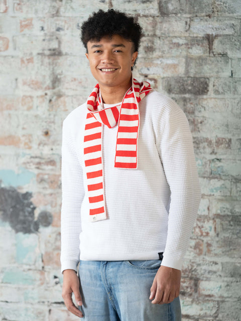 man wearing red and cream skinny merino wool stripe scarf - Woolkind