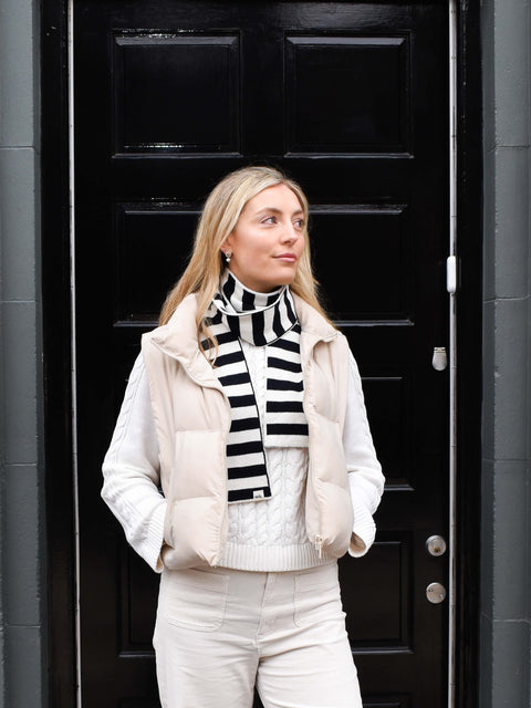 woman wearing black and white skinny merino lambswool scarf