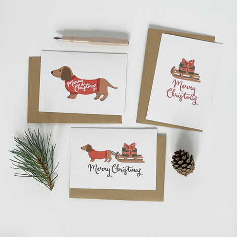 Dachshund pulling a Sledge Merry Christmas Card Pack - 1 Pack - Lomond Paper Co - Made Scotland