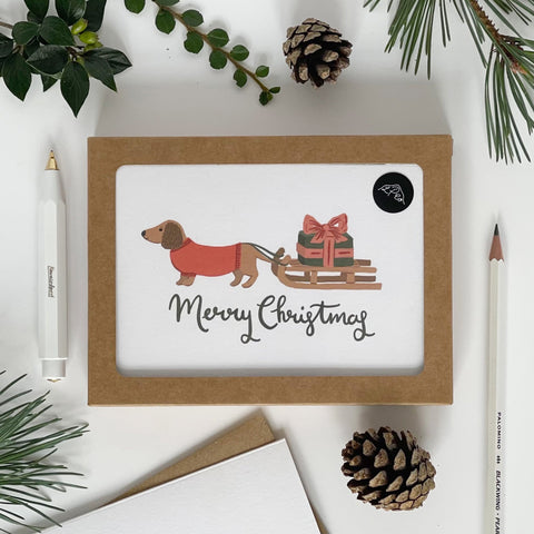 Dachshund pulling a Sledge Merry Christmas Card Pack - 1 Pack - Lomond Paper Co - Made Scotland